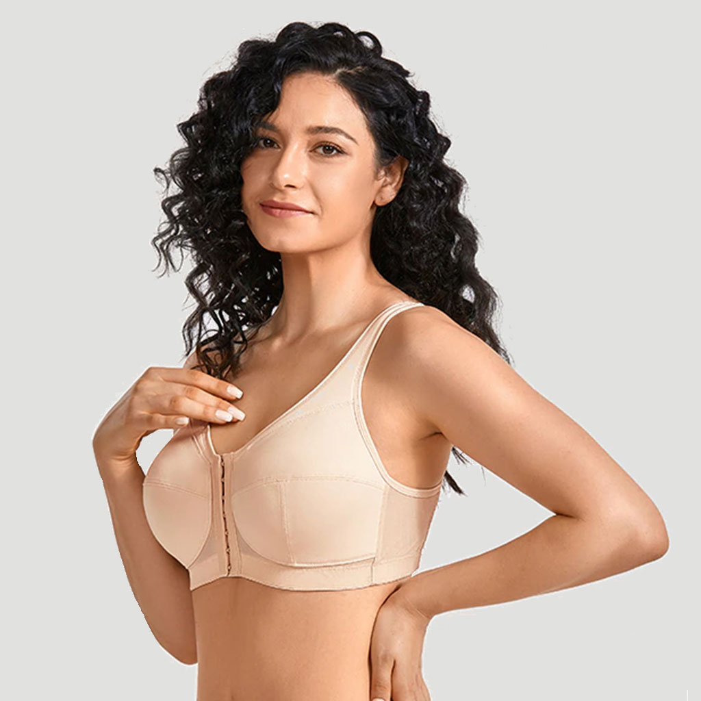 Girl with brown hair wearing a white free front closure beige bra